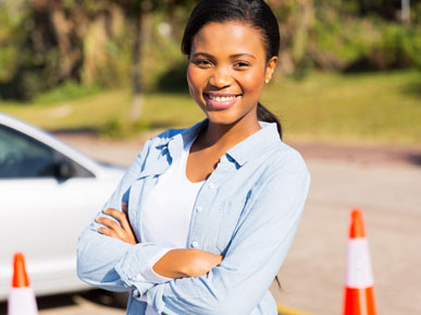 Smiling Woman Taking Road Exam